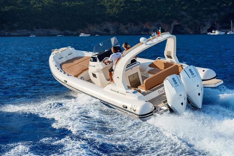 The Image of 2025 Nuova Jolly Prince 30 Exclusive boat cruising on blue ocean waters. - 1