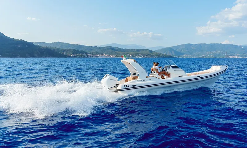 Slide: The Image of 2025 Nuova Jolly Prince 30 Exclusive boat cruising on blue ocean waters. - 21