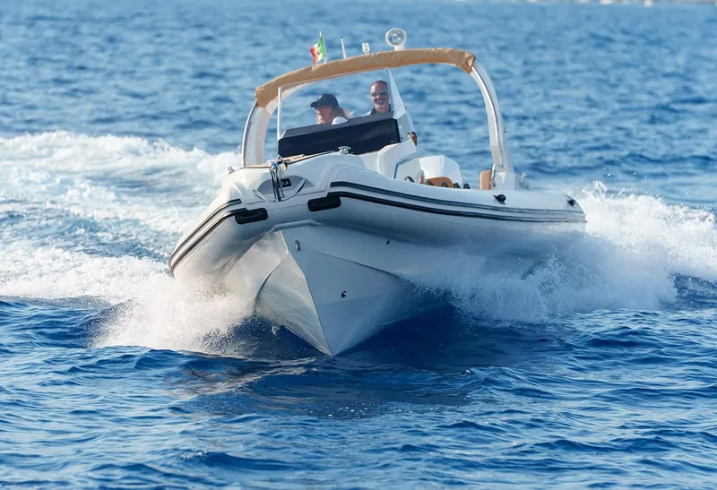 Slide: The Image of 2025 Nuova Jolly Prince 30 Exclusive boat cruising on open sea. - 3