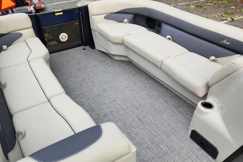 Slide: The Image of 2024 Barletta Aria 24QC pontoon boat interior with spacious seating and modern design. - 11