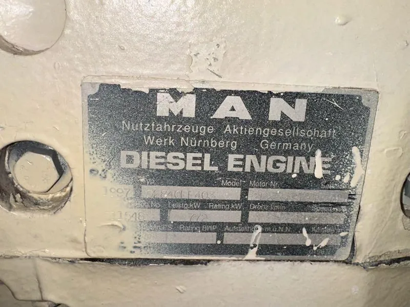 Slide: The Image of MAN diesel engine label on a 1998 Post 50 Sportfish boat. - 17