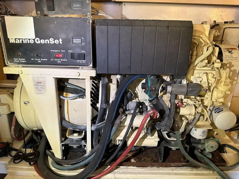 Slide: The Image of Marine generator in a 1998 Post 50 Sportfish boat engine room. - 27