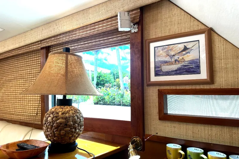 Slide: The Image of Interior of 1998 Post 50 Sportfish with lamp, window, and framed artwork. - 46