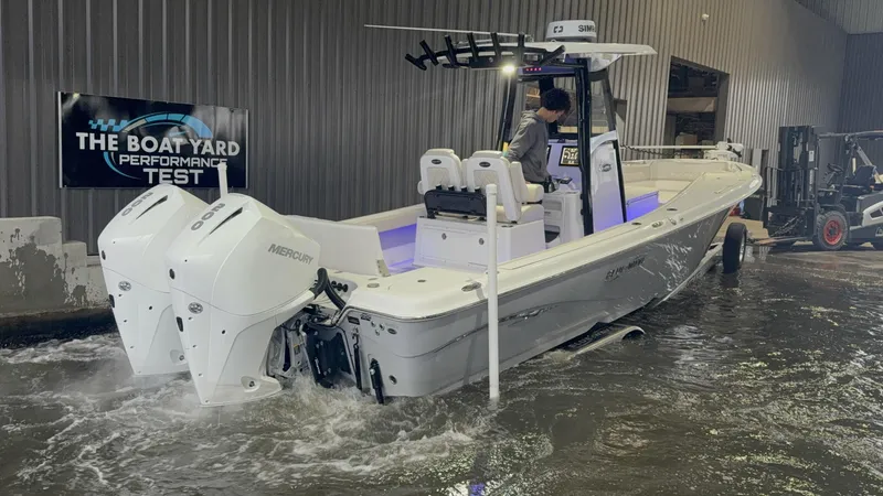 Slide: The Image of 2022 Blue Wave 2800 Makaira boat undergoing performance test in a boat yard. - 17