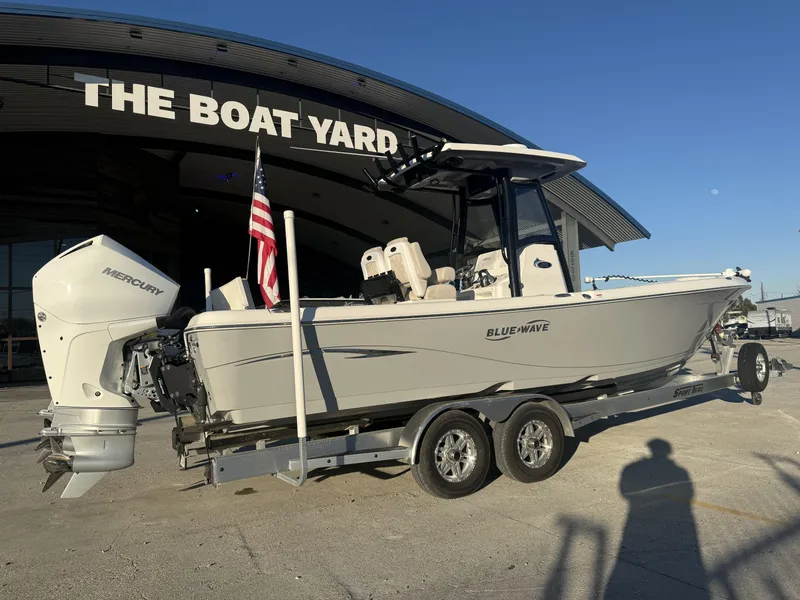 Slide: The Image of 2022 Blue Wave 2800 Makaira boat on trailer at The Boat Yard. - 2