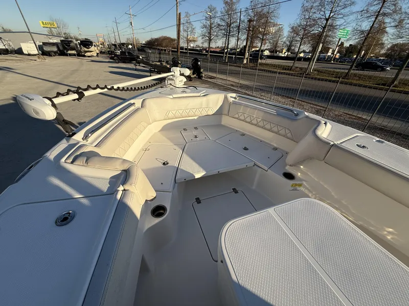 Slide: The Image of 2022 Blue Wave 2800 Makaira boat interior with spacious seating and storage compartments. - 4