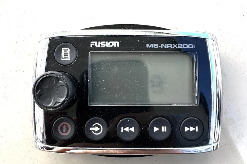 Slide: The Image of Fusion MS-NRX200i marine stereo controller on a 2010 Sea Ray 370 Sundancer. - 13