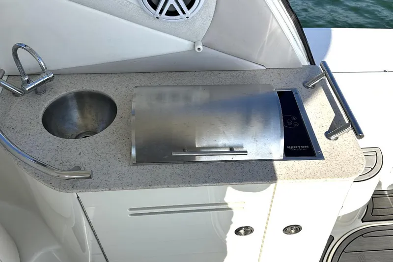 Slide: The Image of Outdoor kitchenette on 2010 Sea Ray 370 Sundancer yacht with sink and grill. - 14