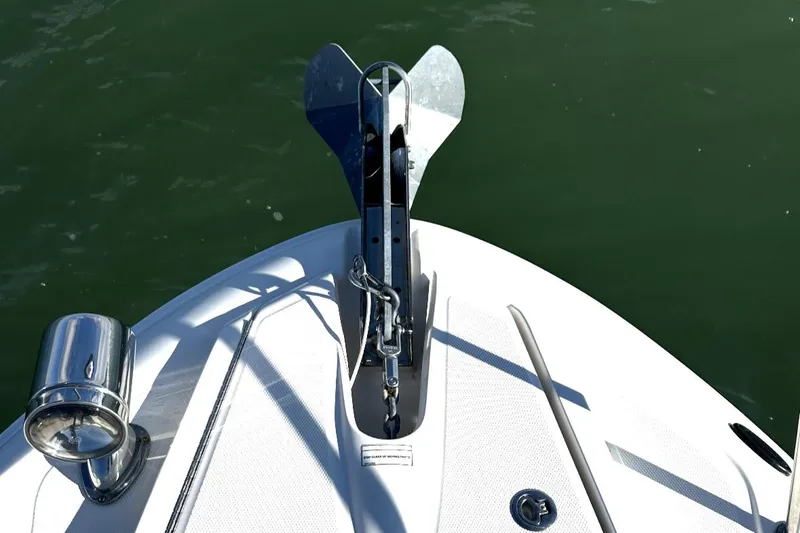 Slide: The Image of Bow of 2010 Sea Ray 370 Sundancer with anchor and spotlight. - 23