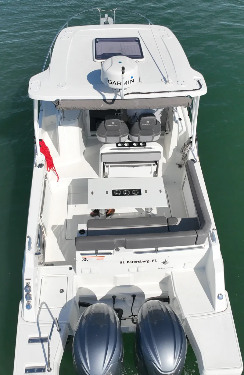 Slide: The Image of 2021 Jeanneau Leader 9.0 WA boat on water, aerial view. - 17