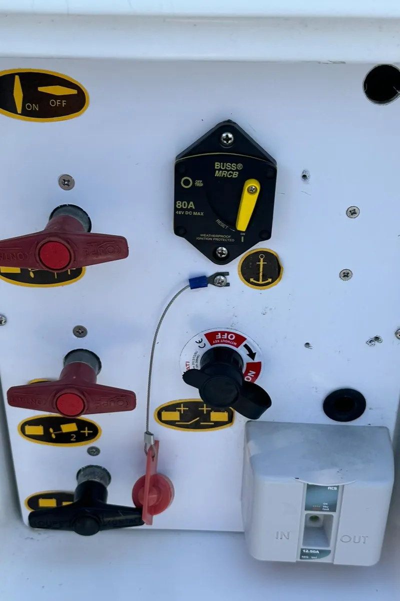 Slide: The Image of Control panel of a 2021 Jeanneau Leader 9.0 WA boat with switches and dials. - 21