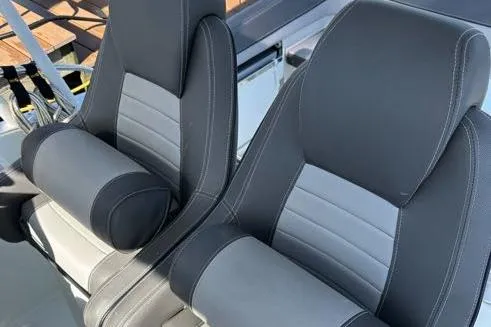 Slide: The Image of 2021 Jeanneau Leader 9.0 WA boat seats, featuring sleek black and gray design. - 27