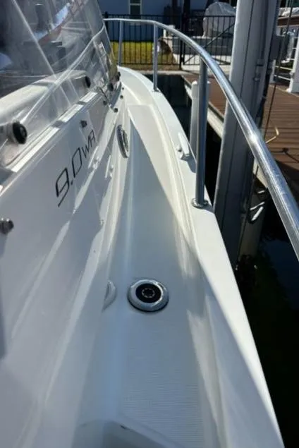 Slide: The Image of 2021 Jeanneau Leader 9.0 WA boat deck with railing and drain. - 42
