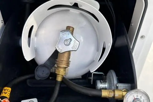 Slide: The Image of Propane tank setup on 2021 Jeanneau Leader 9.0 WA boat. - 43