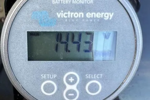 Slide: The Image of Victron Energy battery monitor displaying 14.43 volts on Jeanneau Leader 9.0 WA, 2021 model. - 45