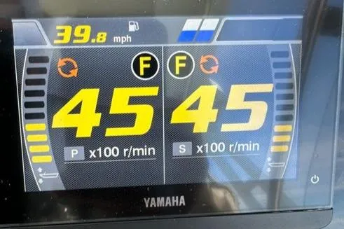 Slide: The Image of Digital display showing 39.8 mph speed and engine RPMs on a Yamaha system. - 48