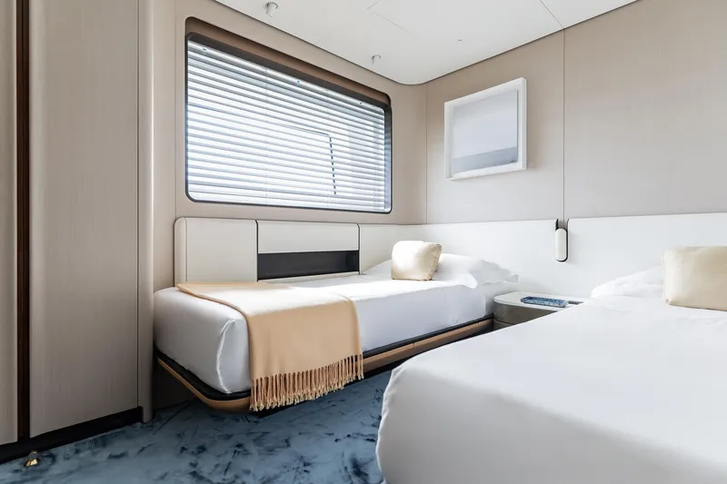 Slide: The Image of Luxurious bedroom interior of 2024 Azimut Grande 36M yacht, featuring modern design and elegant furnishings. - 22