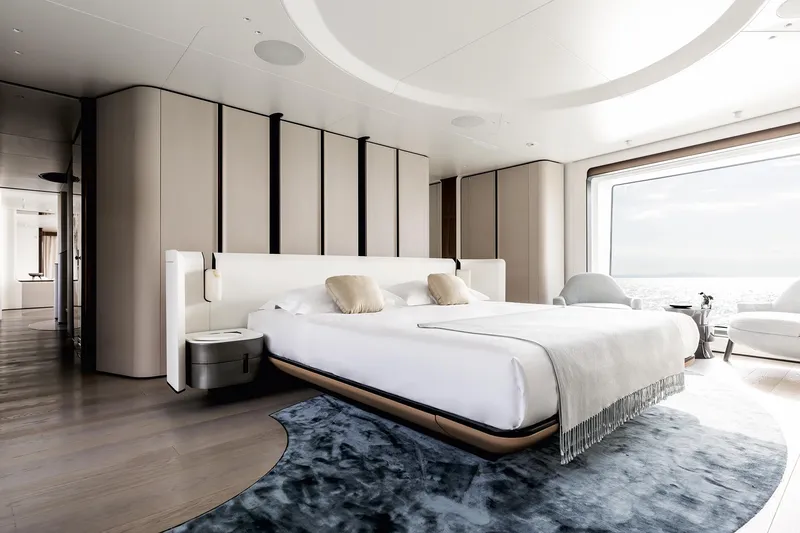 Slide: The Image of Luxurious bedroom interior on 2024 Azimut Grande 36M yacht, featuring modern design and ocean view. - 28