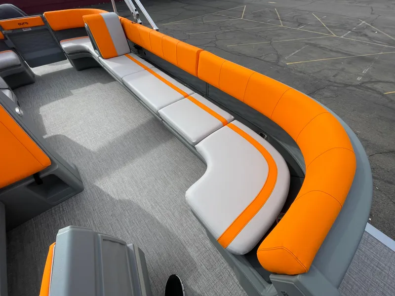 Slide: The Image of Avalon 21 AURA 2025 boat interior with orange and gray seating. - 4