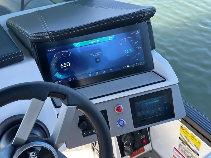 Slide: The Image of Dashboard of 2025 Montara Surf Boss 2.0 25 boat with digital display and controls. - 11