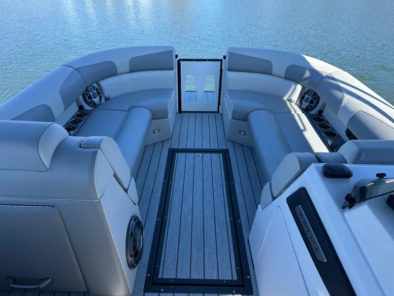 Slide: The Image of 2025 Montara Surf Boss 2.0 25 boat interior with spacious seating and sleek design. - 16