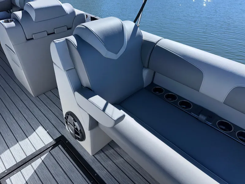 Slide: The Image of Luxurious seating on 2025 Montara Surf Boss 2.0 25 boat, featuring sleek design and cup holders. - 19