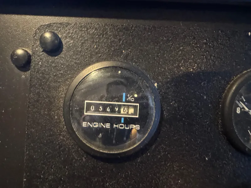 Slide: The Image of Engine hours gauge showing 5461 hours on 1997 Sumerset 85x18. - 39