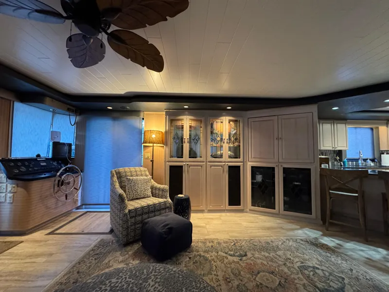 Slide: The Image of Interior of a 1997 Sumerset 85x18 houseboat with elegant furnishings and modern decor. - 7