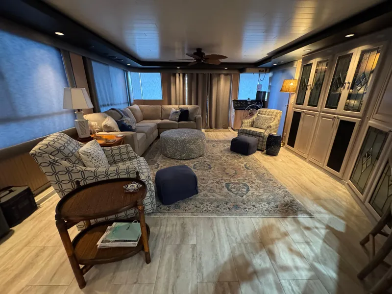 Slide: The Image of Luxurious interior of a 1997 Sumerset 85x18 houseboat with elegant furnishings and decor. - 8