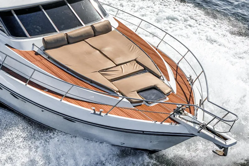 Slide: The Image of Johnson Pilothouse 70 Motor Yacht from 2002 cruising at sea. - 28