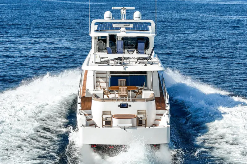 Slide: The Image of Johnson Pilothouse 70 Motor Yacht 2002 cruising on open sea. - 36