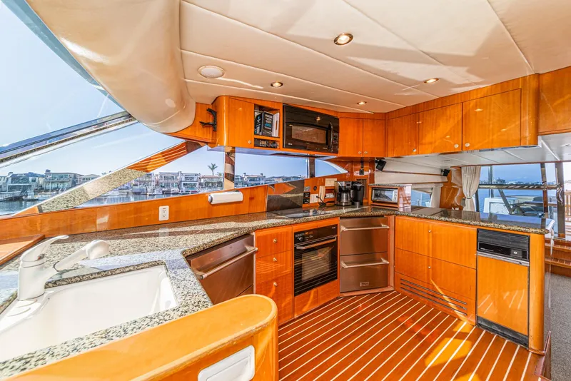 Slide: The Image of Interior view of 2002 Johnson Pilothouse 70 Motor Yacht kitchen. - 46