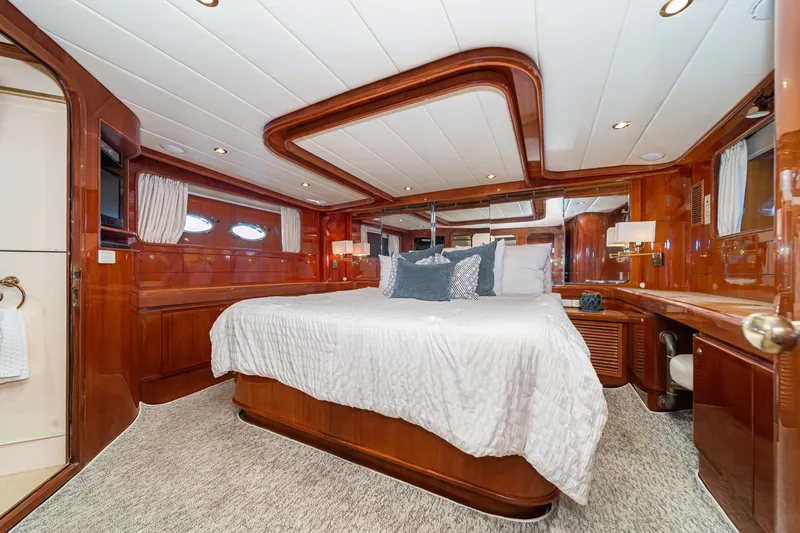 Slide: The Image of Luxurious bedroom in a 2002 Johnson Pilothouse 70 Motor Yacht. - 47