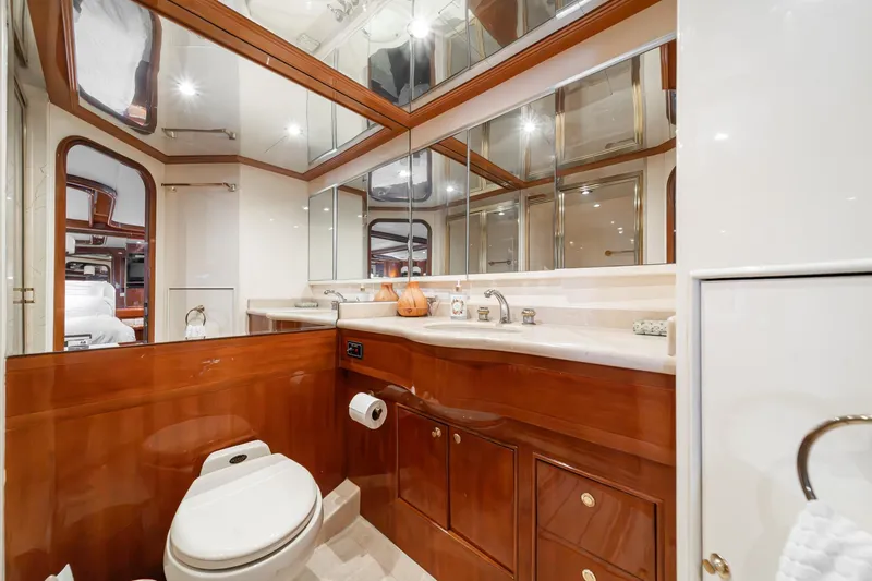 Slide: The Image of Luxurious bathroom in a 2002 Johnson Pilothouse 70 Motor Yacht. - 49