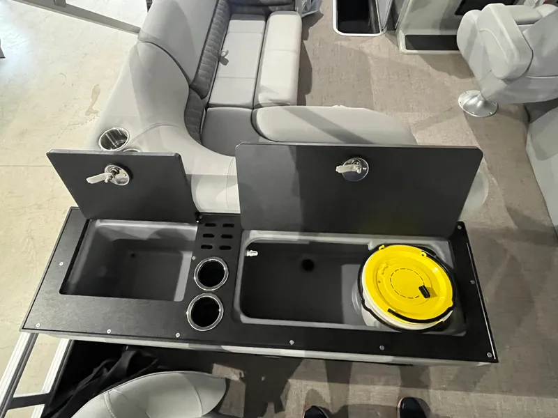 Slide: The Image of 2025 Ranger 223FC boat interior with seating and storage compartments. - 8