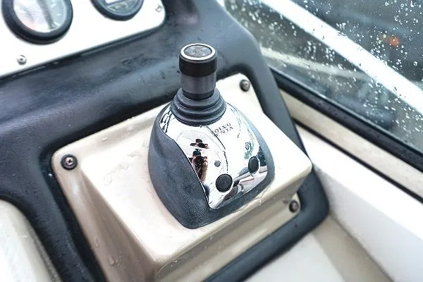 Slide: The Image of Joystick control on 2008 Cruisers 420 Express boat dashboard, close-up view. - 13