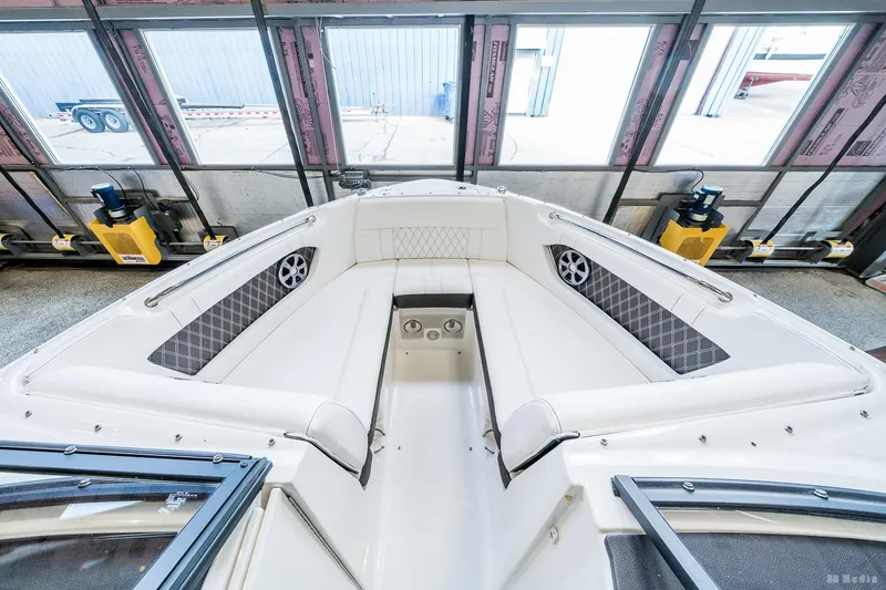 Slide: The Image of 2020 Sea Ray 230SLX boat interior with white seating and modern design. - 21