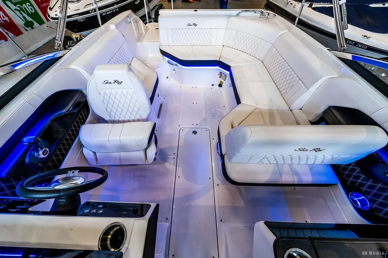 Slide: The Image of Luxurious interior of 2020 Sea Ray 230SLX boat with elegant seating and ambient lighting. - 28