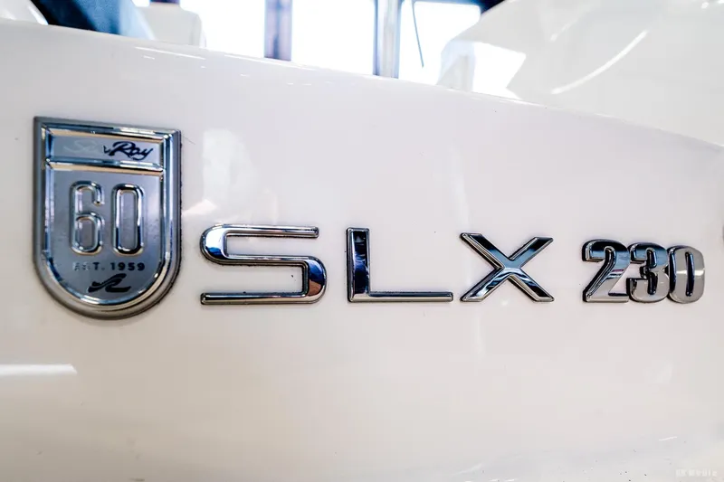 Slide: The Image of 2020 Sea Ray 230SLX logo and emblem on boat exterior. - 46