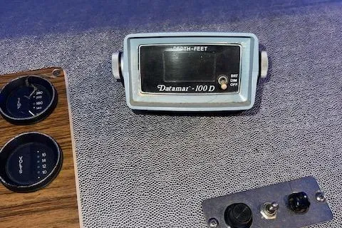 Slide: The Image of 1977 Datamar 100D depth gauge on textured panel with control knobs. - 40