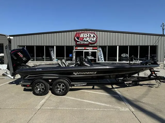 Slide: The Image of 2021 Phoenix 921 ELITE boat parked outside Wieda's Marine dealership. - 1