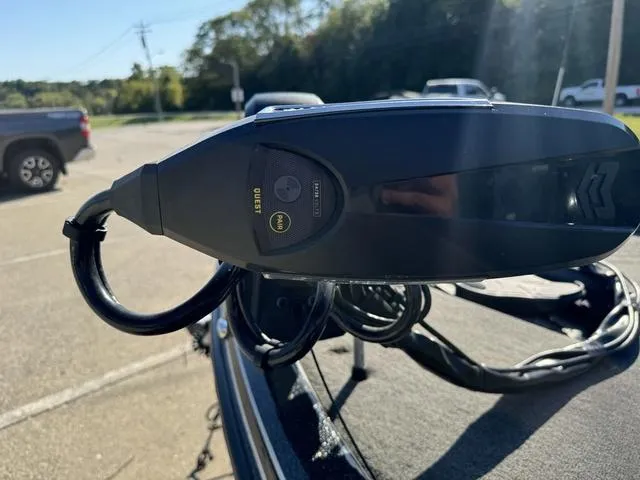 Slide: The Image of Close-up of a 2021 Phoenix 921 ELITE boat component in a parking lot. - 13