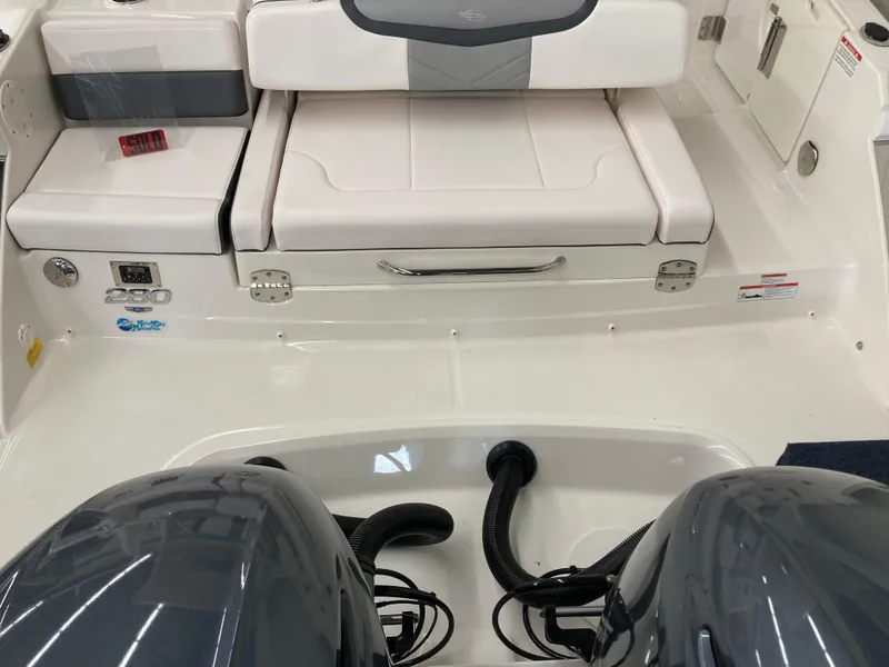 Slide: The Image of 2020 Chaparral 280 OSX boat interior with seating and engine view. - 12