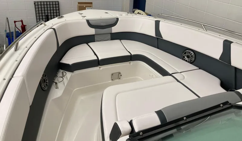Slide: The Image of 2020 Chaparral 280 OSX boat interior with white and gray seating. - 8