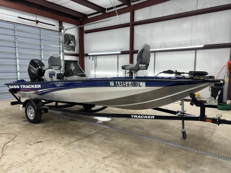Slide: The Image of 2012 Tracker Pro Team 175 TF bass boat in a garage setting. - 6