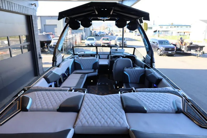 Slide: The Image of 2025 Tigé 24RZX boat interior with luxurious seating and modern design. - 15