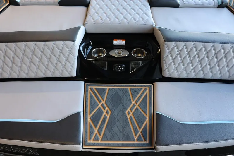 Slide: The Image of 2025 Tigé 24RZX boat interior with quilted seats and stylish flooring. - 16