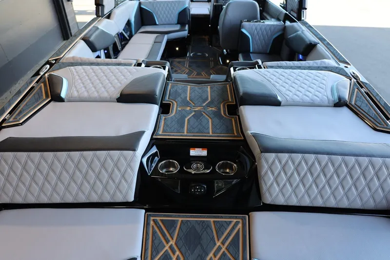 Slide: The Image of 2025 Tigé 24RZX boat interior with luxurious seating and modern design. - 17