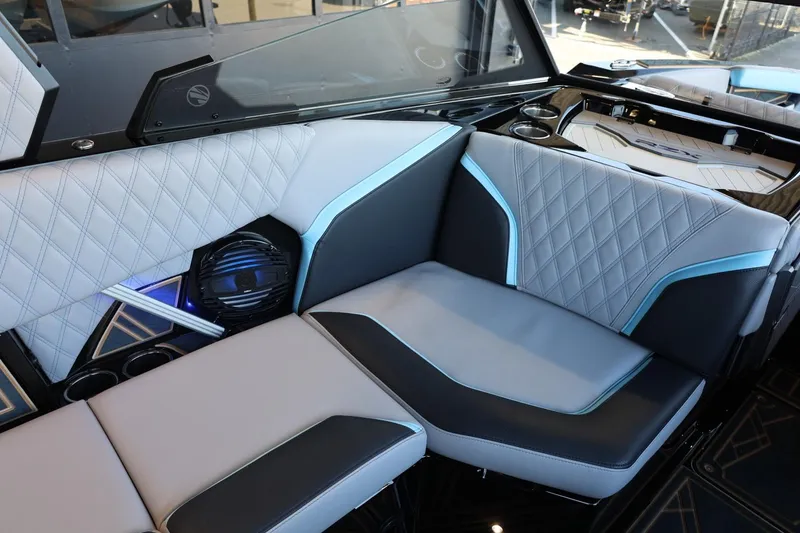 Slide: The Image of 2025 Tigé 24RZX interior with modern, quilted seating and sleek design elements. - 26