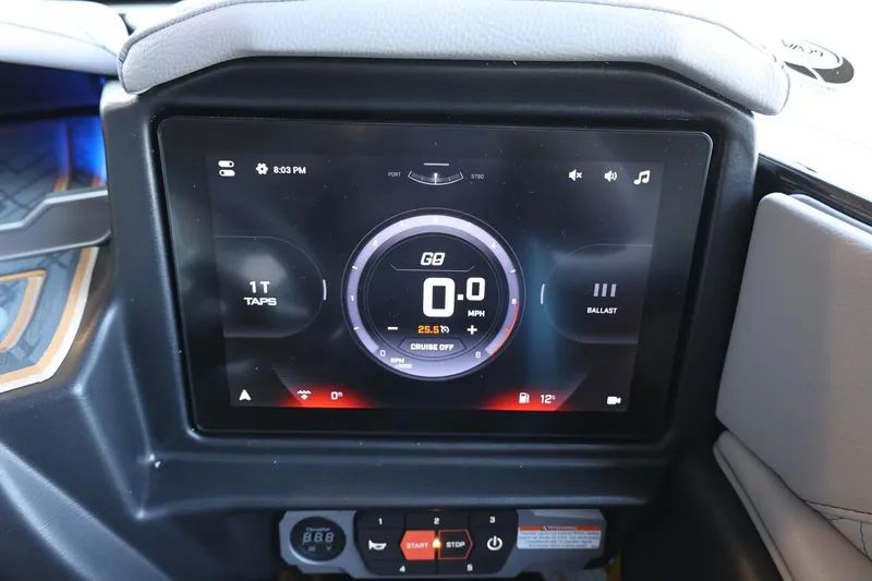 Slide: The Image of Dashboard display of 2025 Tigé 24RZX boat showing speed and controls. - 35